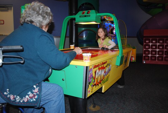 Playing Air Hockey  with Grandma @ Chucky Cheese