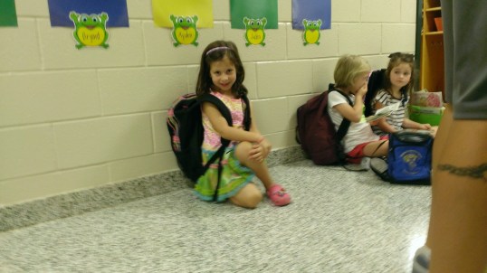 Waiting in line at her new class room