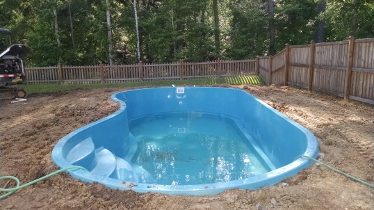 You want me to sod this rough backyard? I didn't feel like smiling