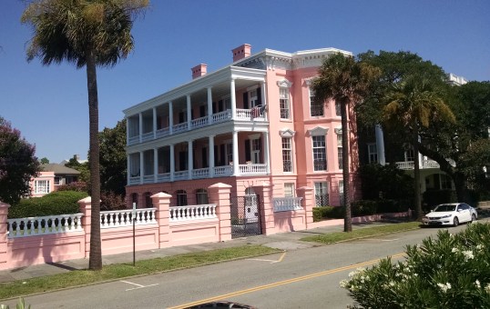 A pink flamingo colored property, reminiscent of the plantation owners in the Caribbean